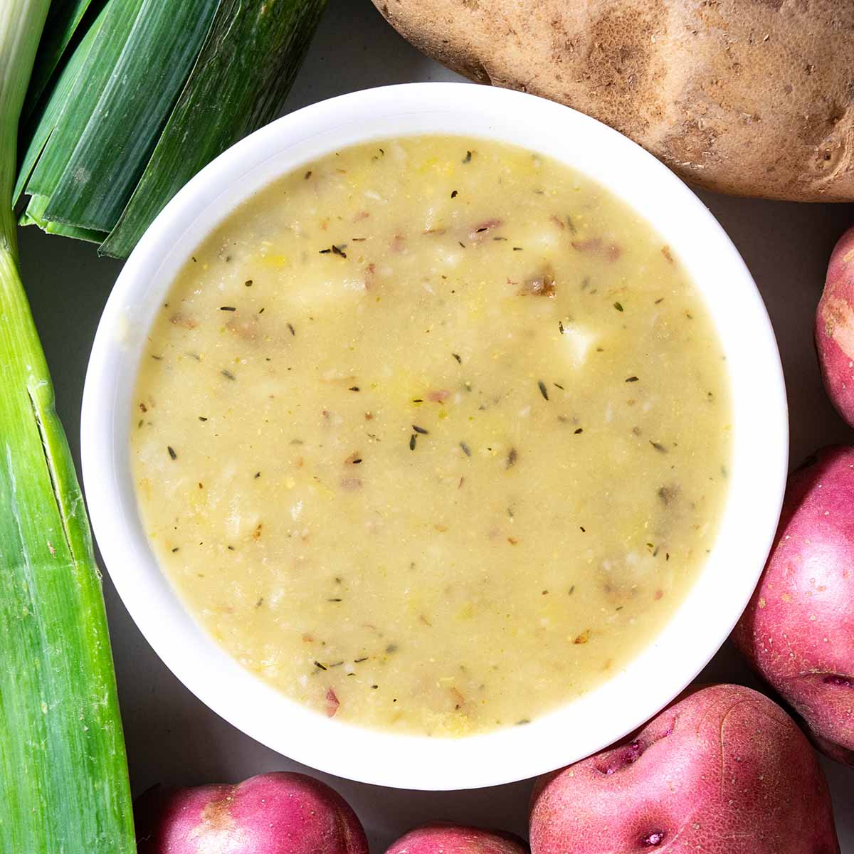 A smooth, creamy potato leek soup with russet potatoes and no cream.