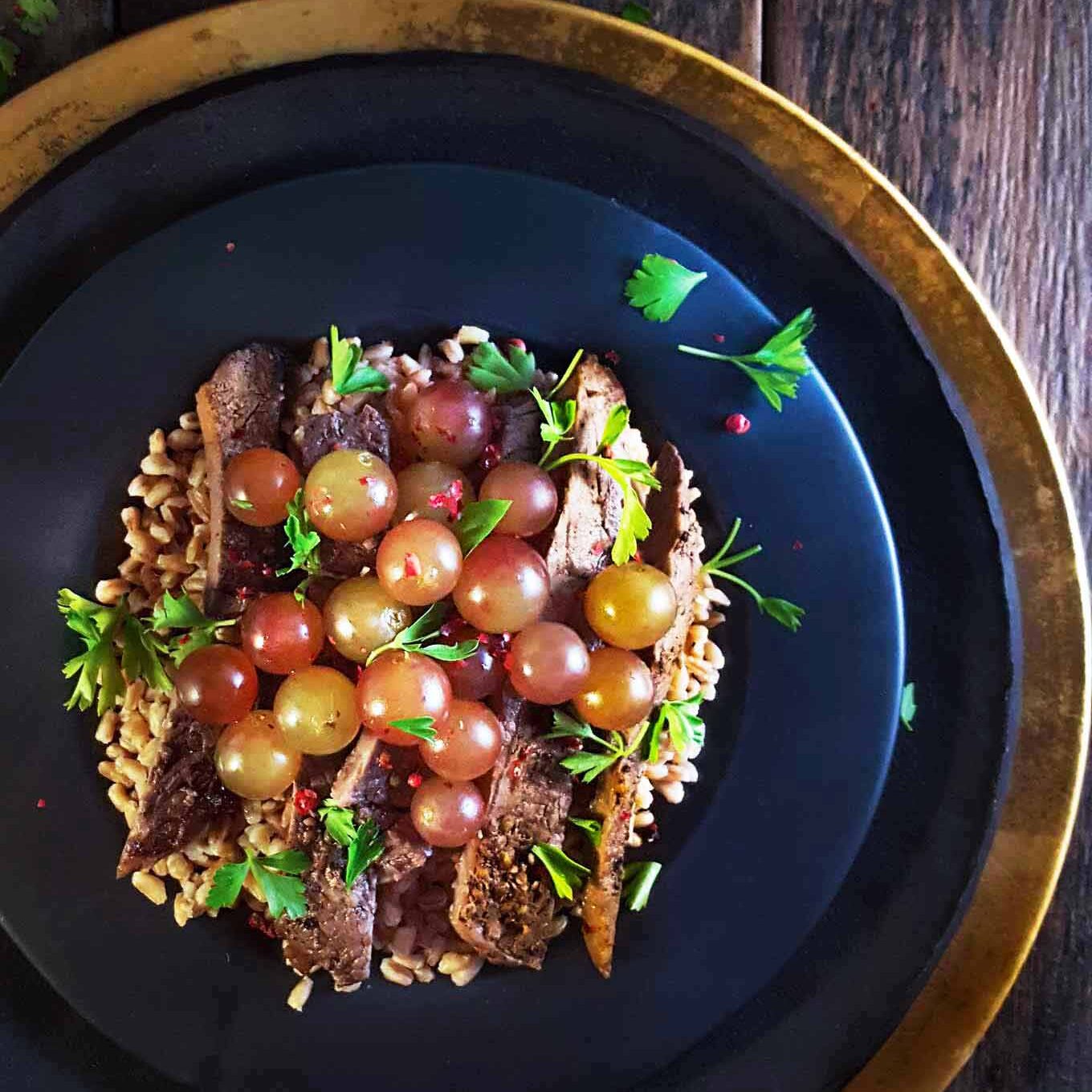 Steak Salad for dinner recipe: Steak salad with farro and roasted grapes.