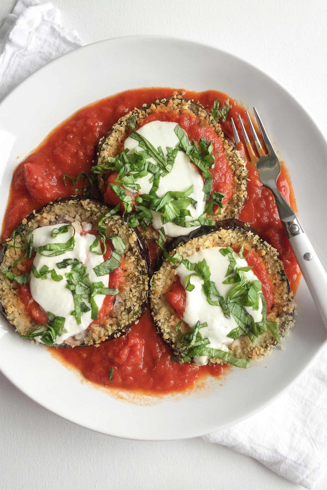 Eggplant recipes in-season - baked eggplant parmesan by Andie Mitchell