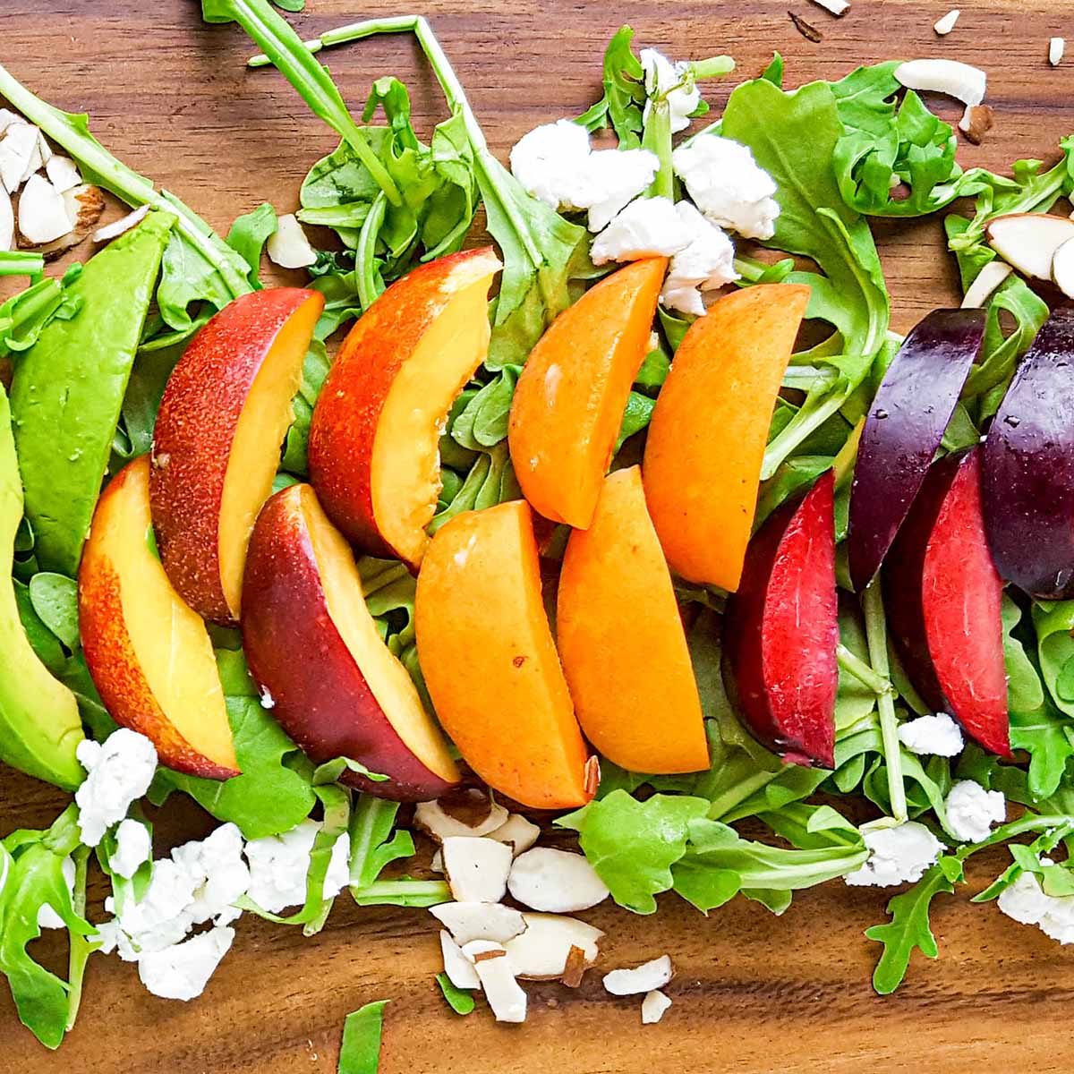 Stone fruit salad with goat cheese and arugula