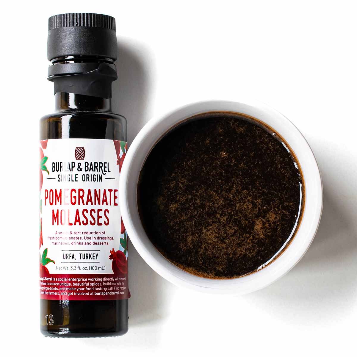 Pomegranate dressing made with pomegranate molasses for the arugula steak salad.