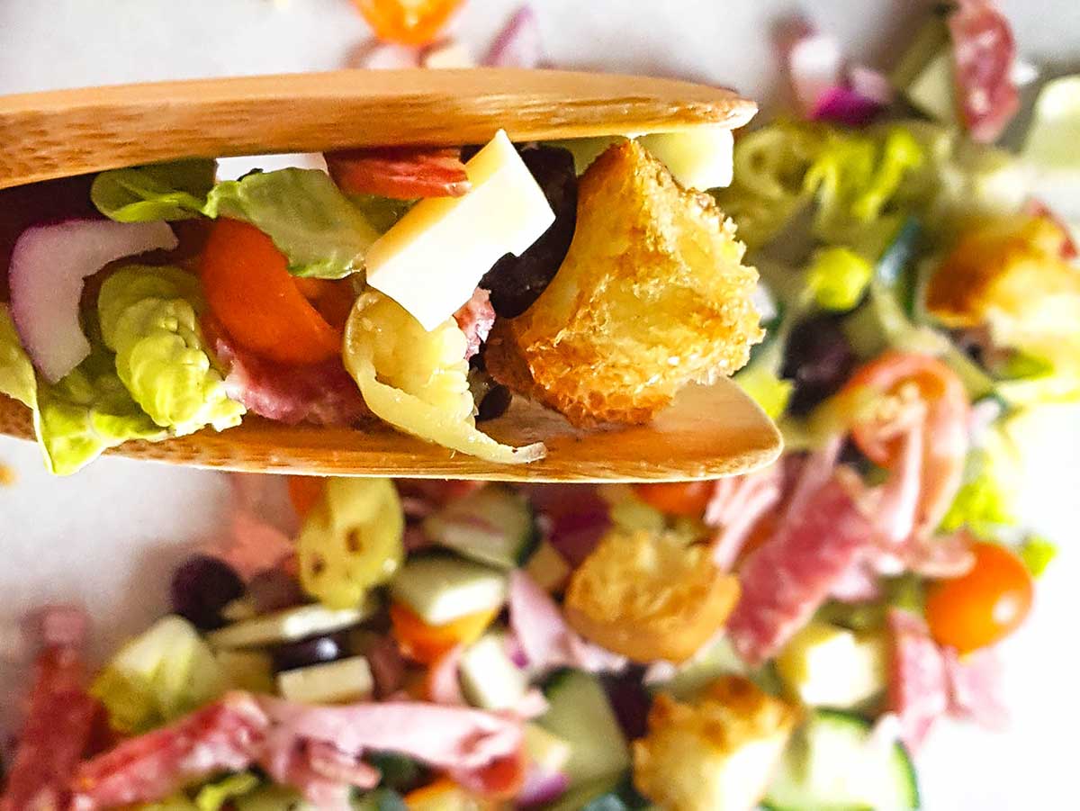 italian sub salad with closeup of ingredients