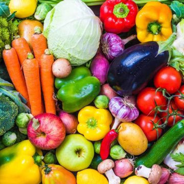 A varieties of fruits and vegetables laid on a table