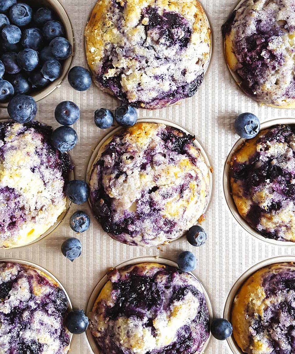 A picture of blueberry muffins in the tin