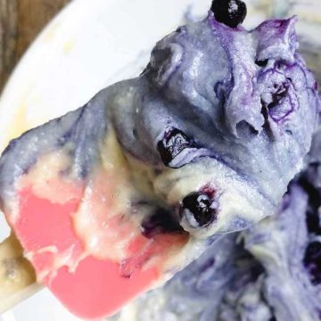 A closeup of blueberry batter that turned blue