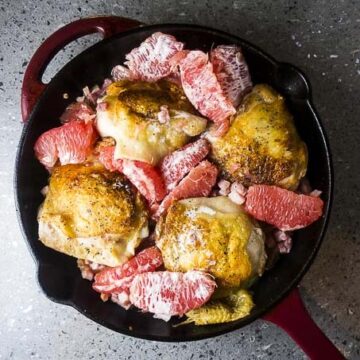 Roasted chicken thighs in a pan with pancetta and grapefruit. By Went There 8 This