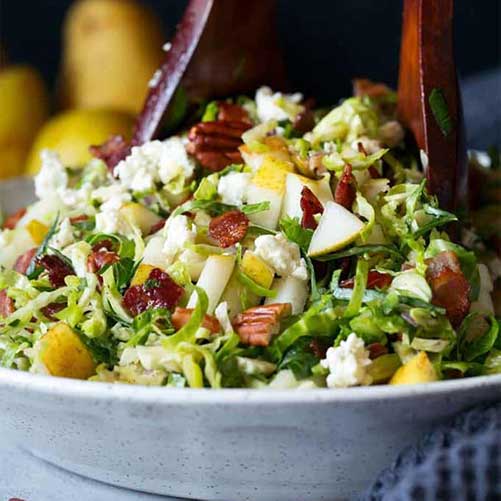 Salad with pear, bacon, and brussels sprouts, by Cooking Classy