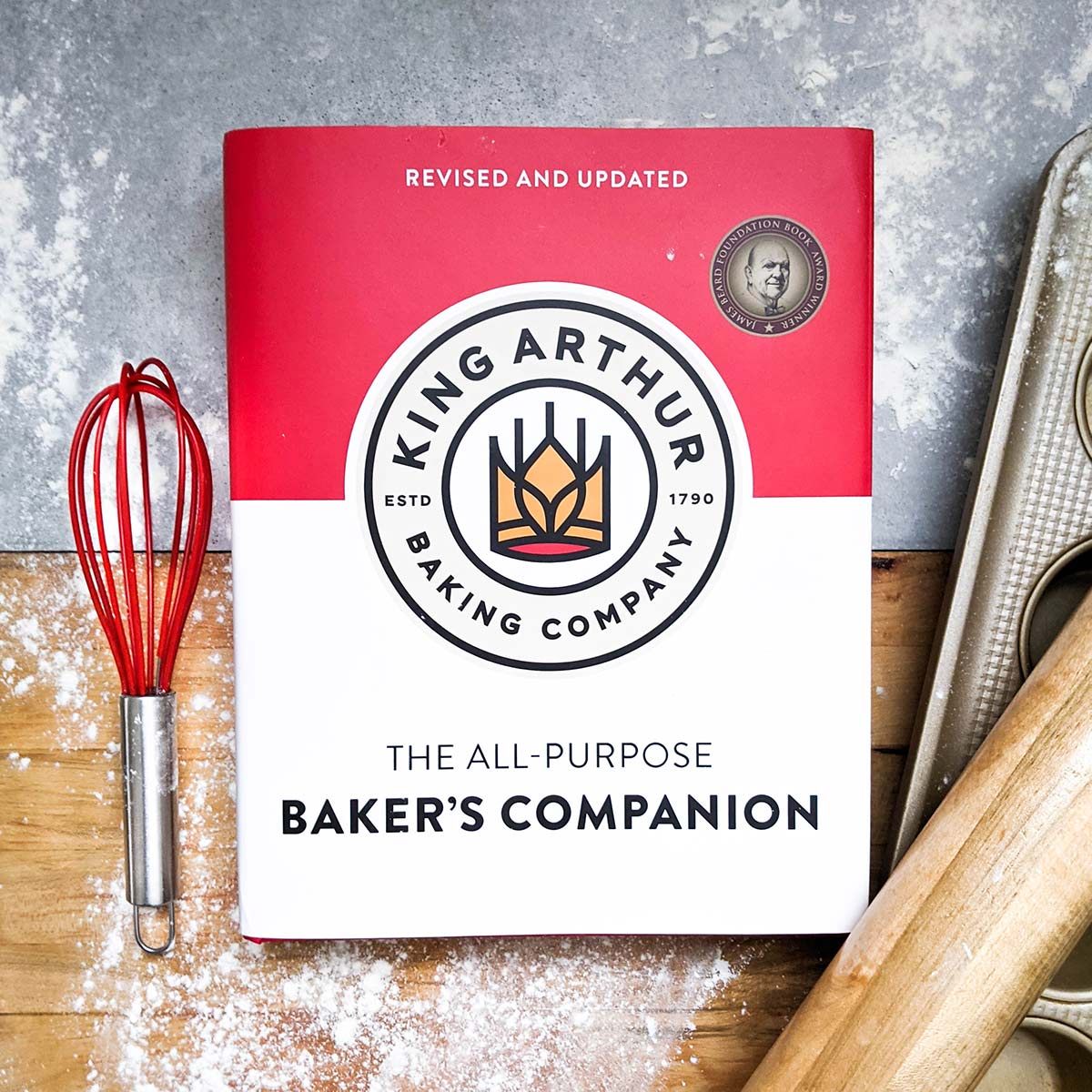 King Arthur Baking Companion cookbook with baking tools