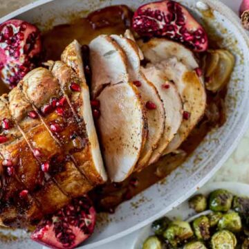 Pomegranate cider pork loin roast with rosemary smashed potatoes, recipe by How Sweet Eats