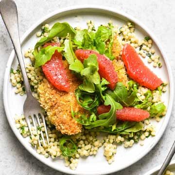 Almond crusted chicken with couscous & grapefruit recipe by Foxes Love Lemons
