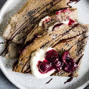 Buckwheat crepes with roasted cherries & chocolate recipe by Snixy Kitchen
