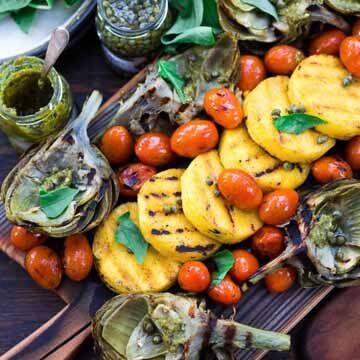 Grilled artichokes & polenta with blistered tomatoes recipe by Feasting at Home