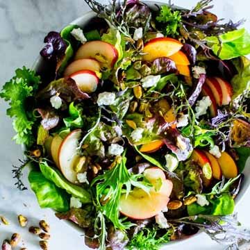 Nectarine, pistachio, and goat cheese salad with honey dijon vinaigrette recipe by Vanilla and Bean