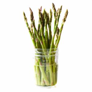 Store asparagus in a cup with water, upright in the fridge