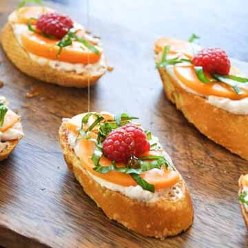 Apricot & raspberry bruschetta with basil ribbons recipe by California Grown