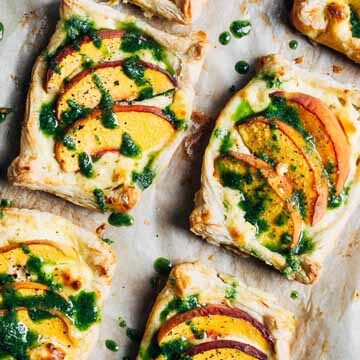 Savory peach & ricotta tarts with basil oil recipe by Brooklyn Supper