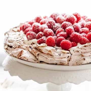 Chocolate pavlova with whipped cream & raspberries by Simply Recipes