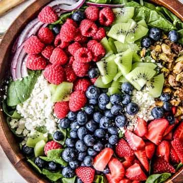 Spinach berry salad with strawberry poppy seed dressing recipe by Carlsbad Cravings