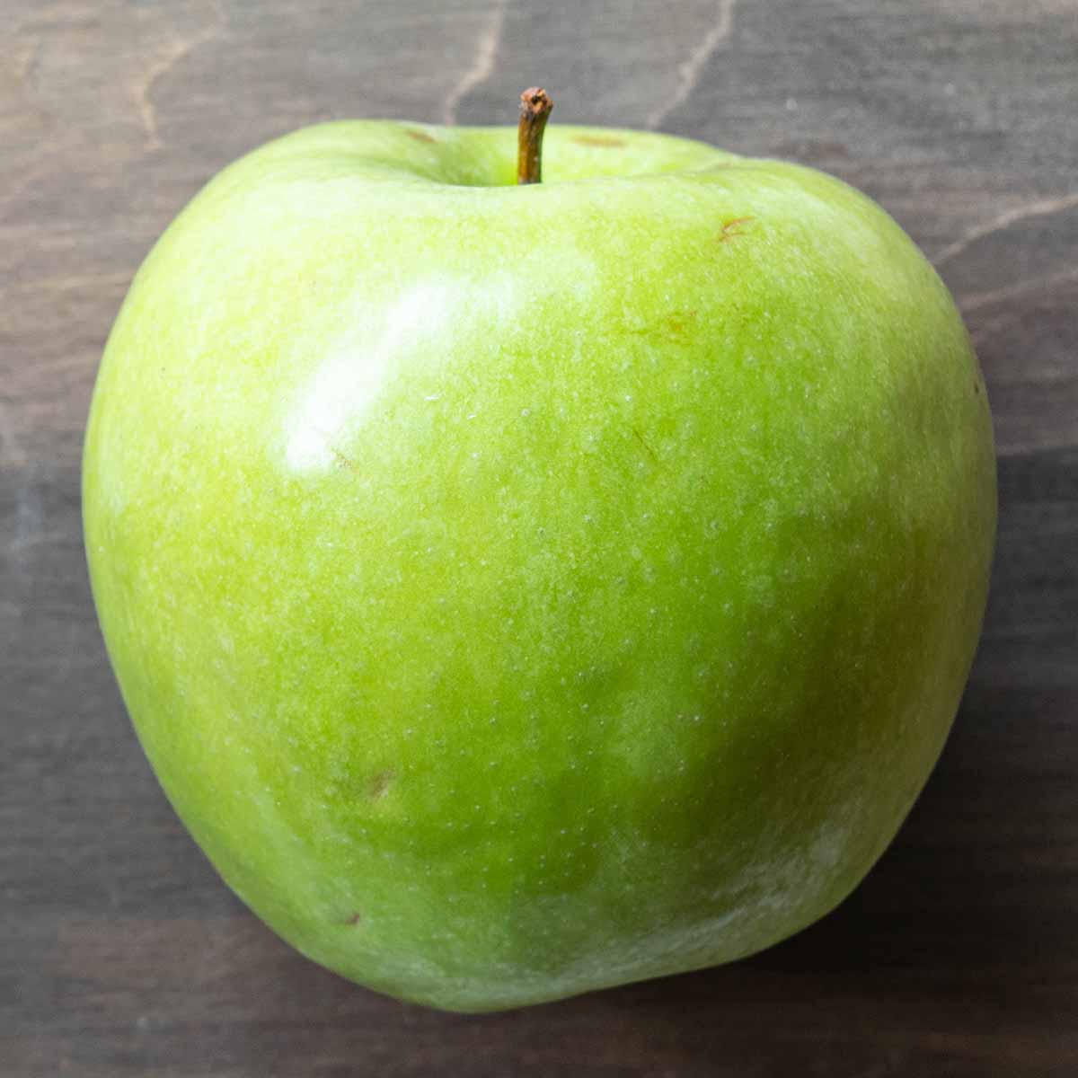 A tart, green Granny Smith apple.