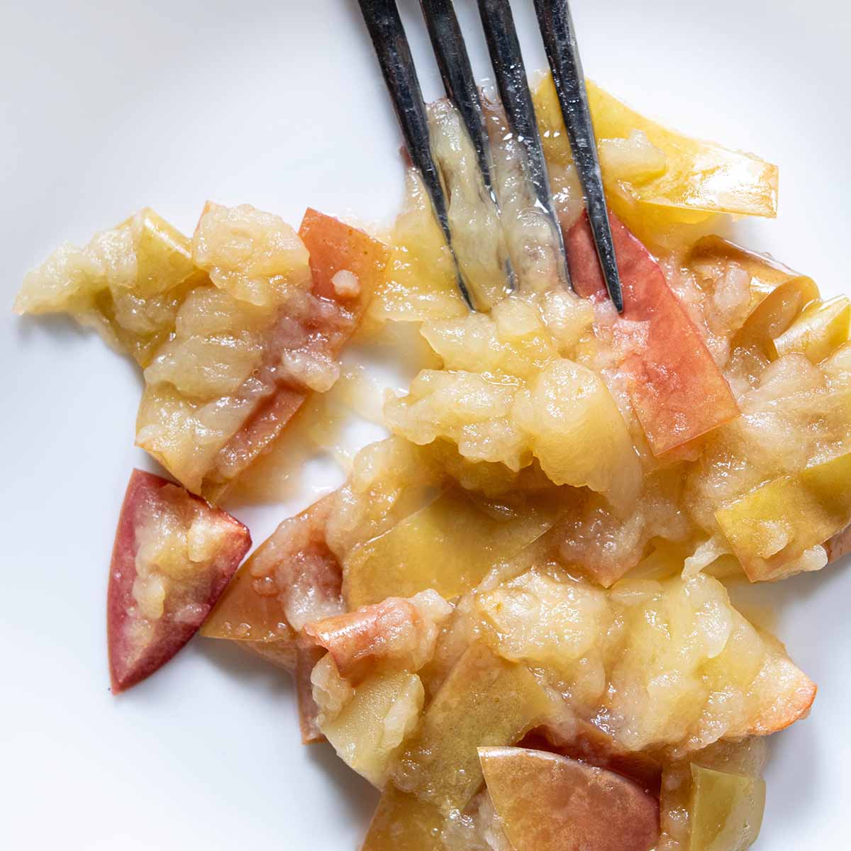 McIntosh apples baked in a pie test. They completely break down into an apple sauce texture.