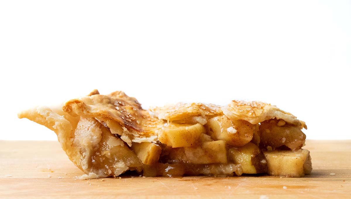 A slice of apple pie showing slices that hold their shape