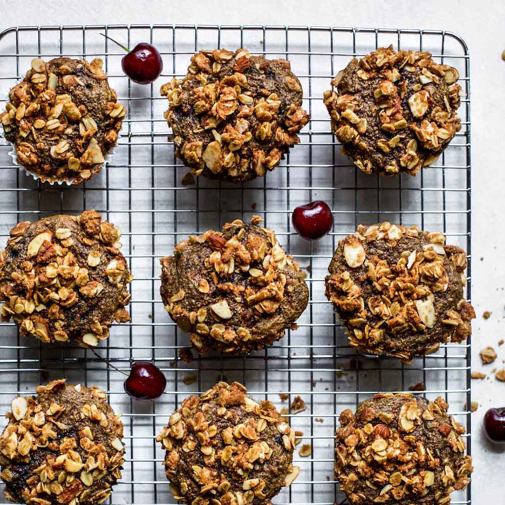 Whole wheat cherry almond streusel muffins on a cooling rack, recipe by My Diary of Us