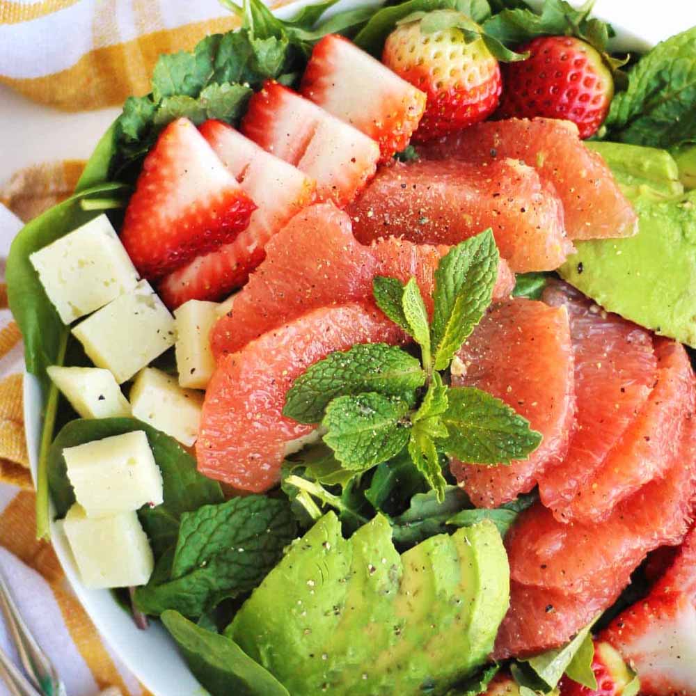 A grapefruit salad with mint, avocado, and strawberries. Recipe from Rhubarbarians.