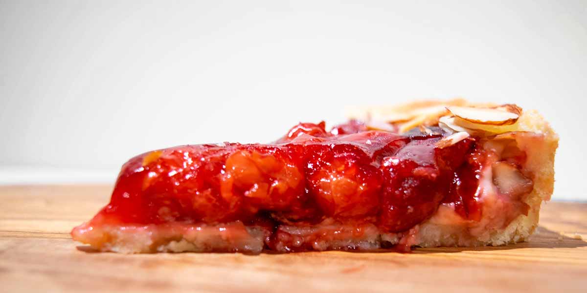 A slice of sour cherry tart