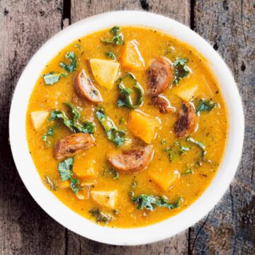 A bowl of Zuppa Toscana soup with butternut squash