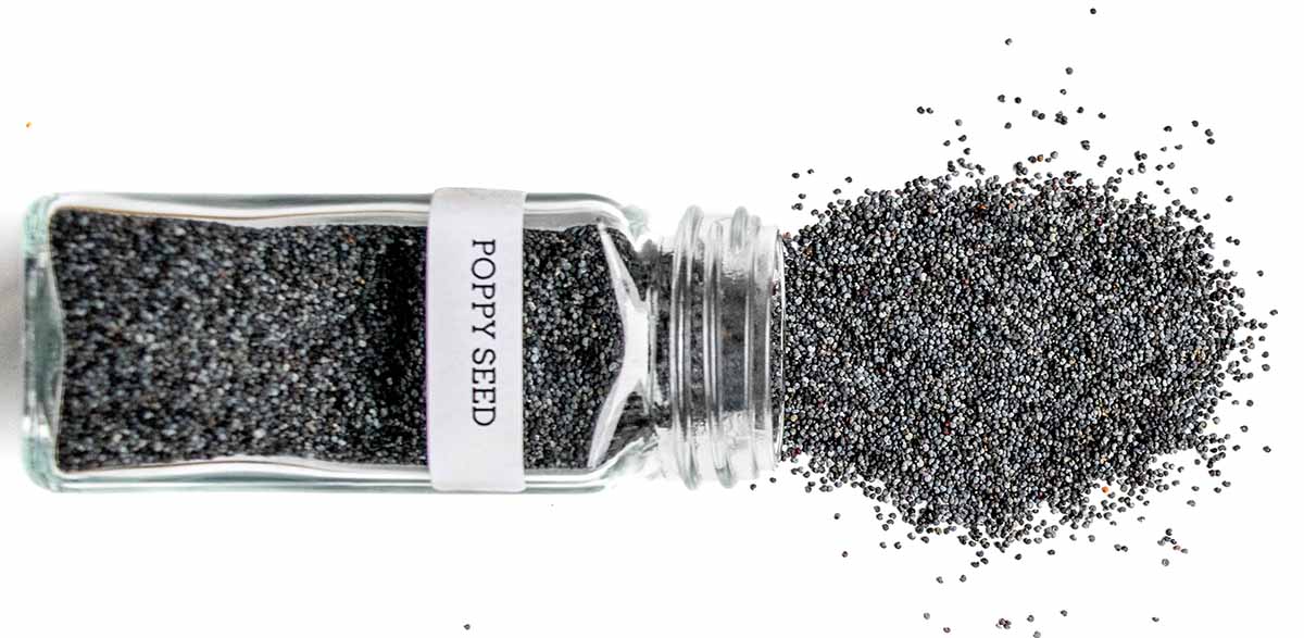 A jar of poppy seeds, tipped over