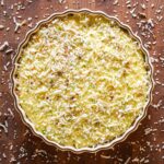 Pawpaw pie with coconut crust on a table