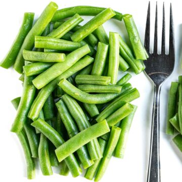 A pile of green beans to visualize the portion and serving size of green bean casseroles for Thanksgiving