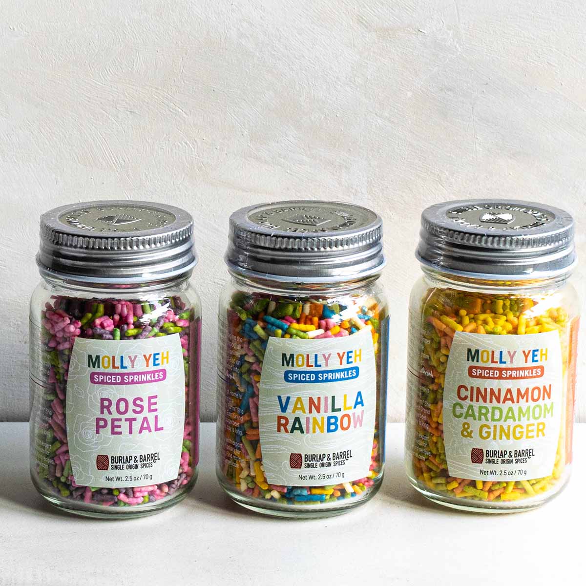 3 flavors of Molly Yeh sprinkles by Burlap & Barrel