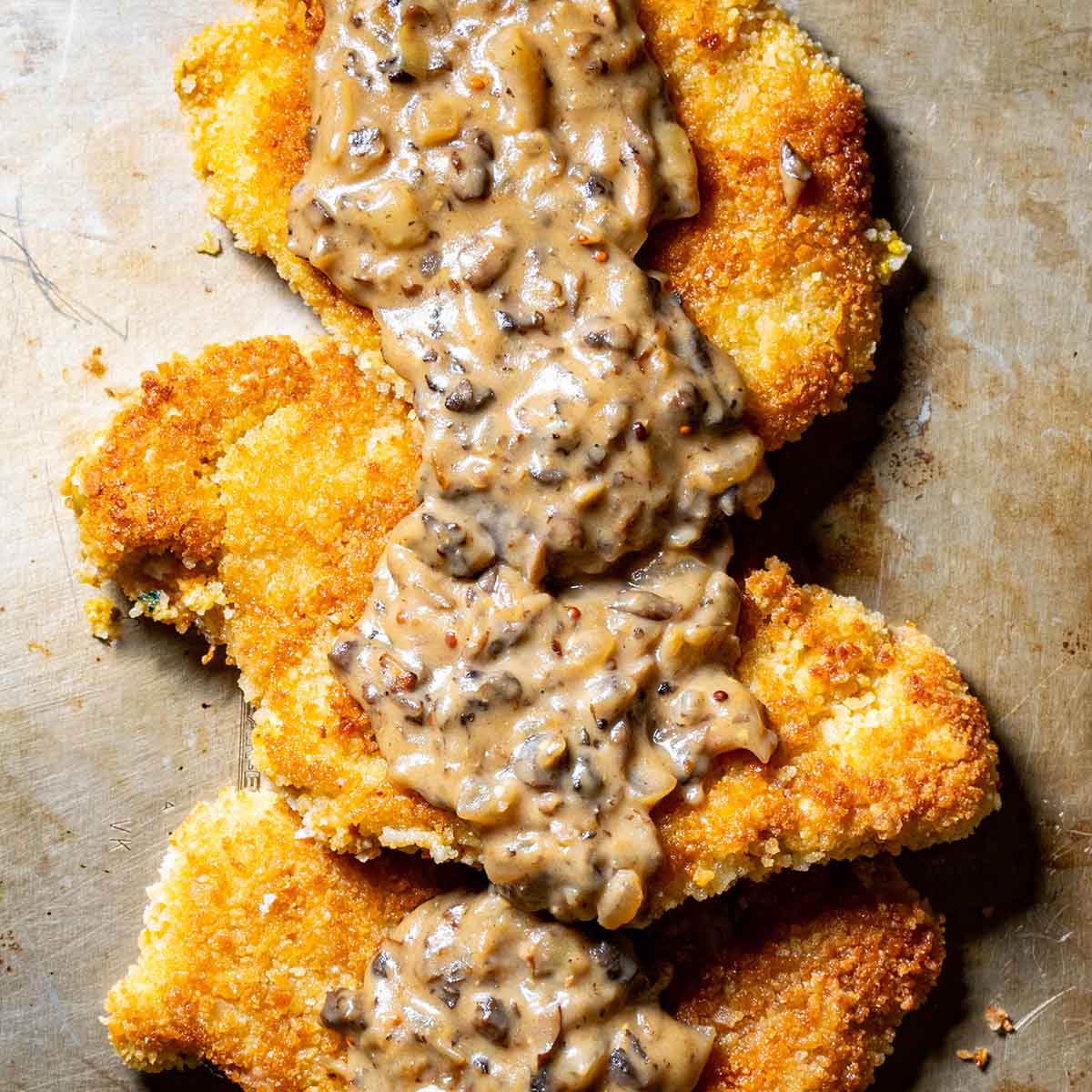 Pork jagerschnitzel covered in a mushroom gravy