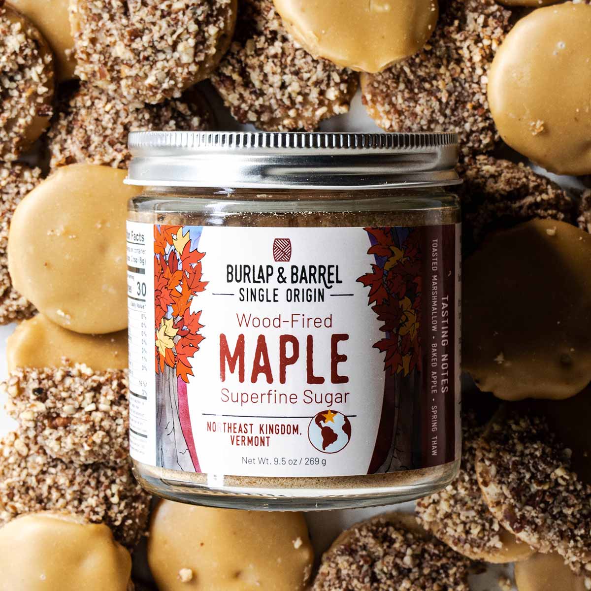 Maple pecan shortbread cookies with a jar of Burlap & Barrel wood-fired maple sugar.