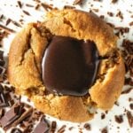 A recipe for soft and chewy peanut butter blossom cookies.