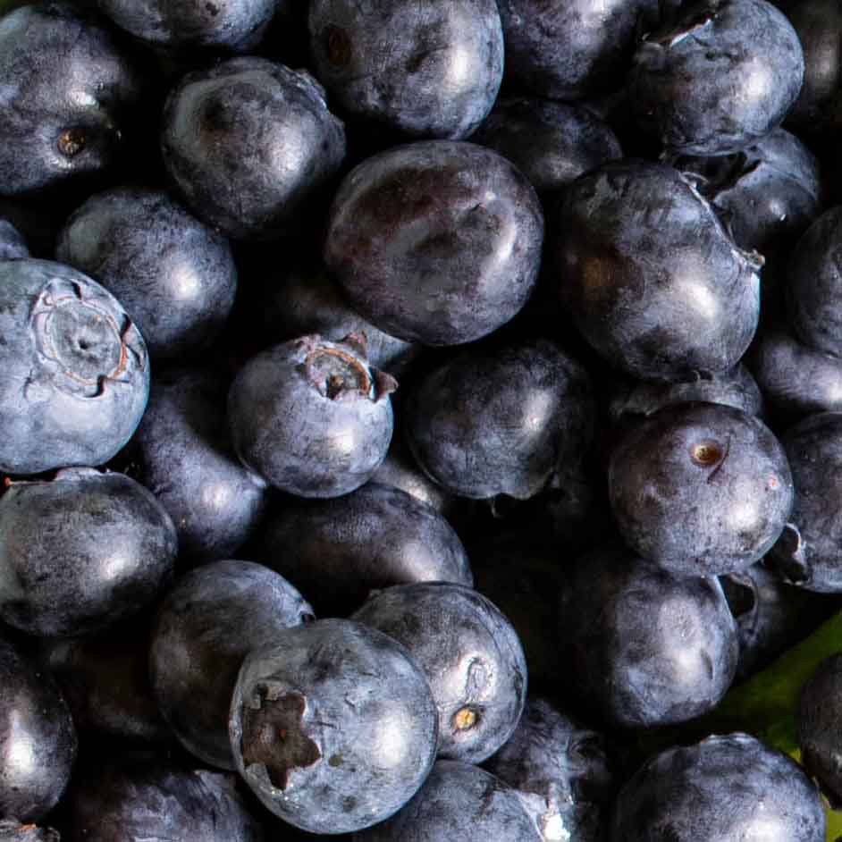 A closeup of blueberries in salad