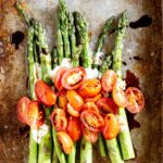 Caprese asparagus salad with fresh tomatoes in early summer
