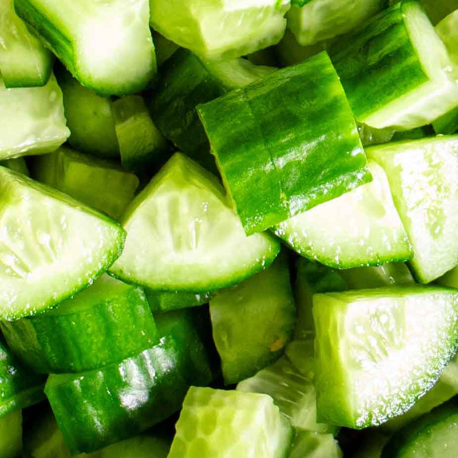 A closeup of cucumbers in a salad