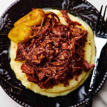 Mississippi pot roast recipe for the slow cooker or oven, perfect for Friendsgiving. Recipe by Ambitious Foodie.