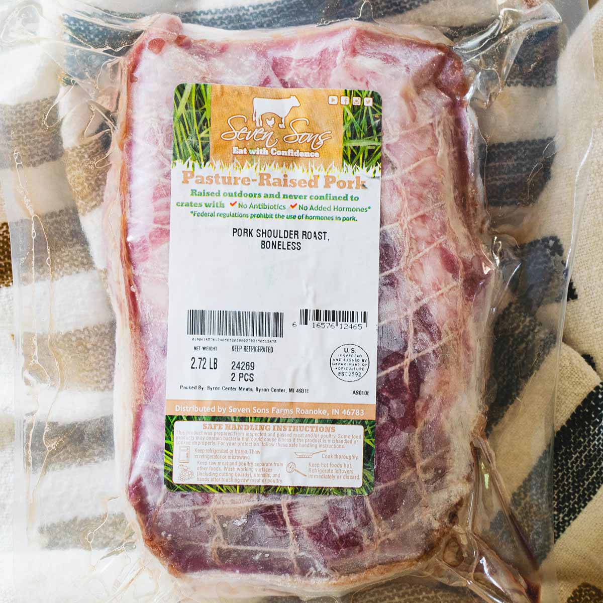 A frozen pork shoulder, just under 3 pounds