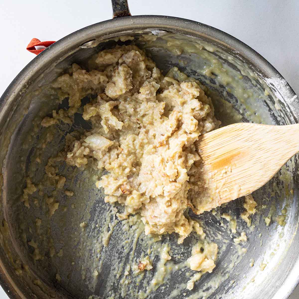 Making a roux with butter and flour for a turkey gravy without drippings. Once broth is added, it turns into a paste before thinned out into a gravy.