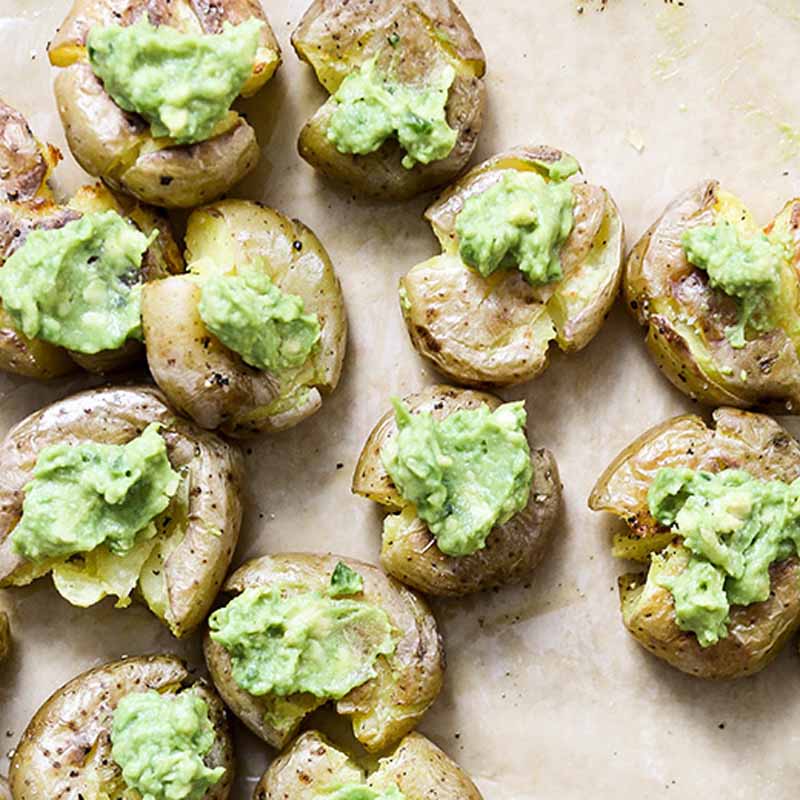 Smashed potatoes topped with a spicy guacamole, from Floating Kitchen.
