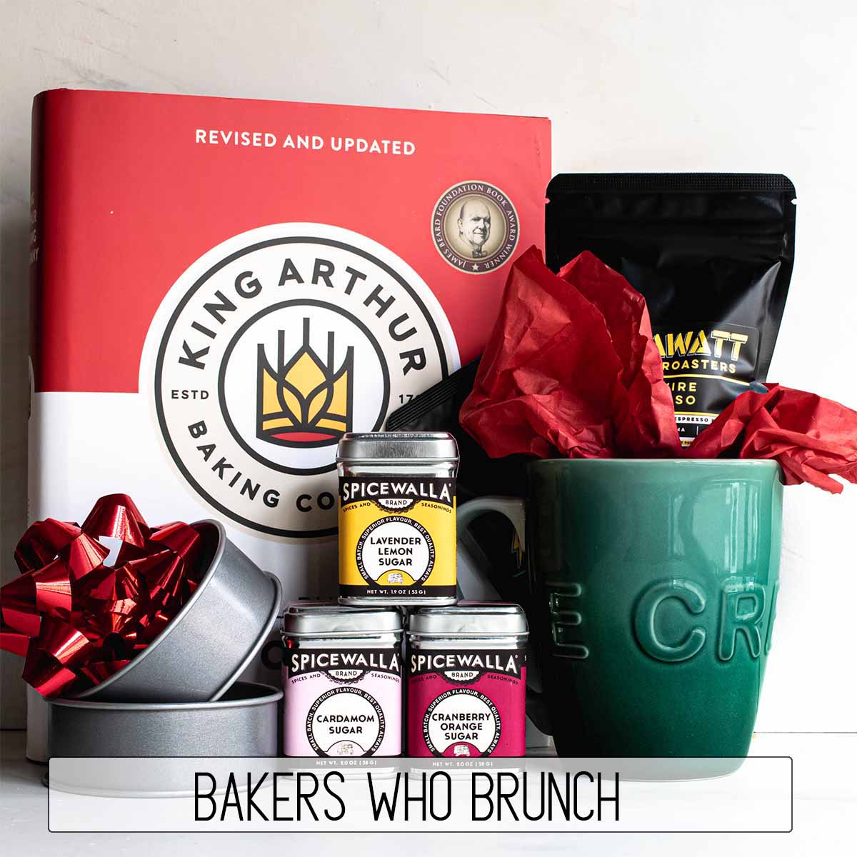 Several items combined to make good gifts for bakers, including a cookbook, flavored sugars, English Muffin rings, a large mug, and specialty coffee.