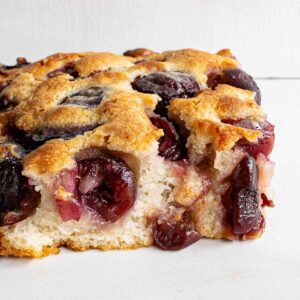 A slice of cherry cobbler to show the interior and exterior