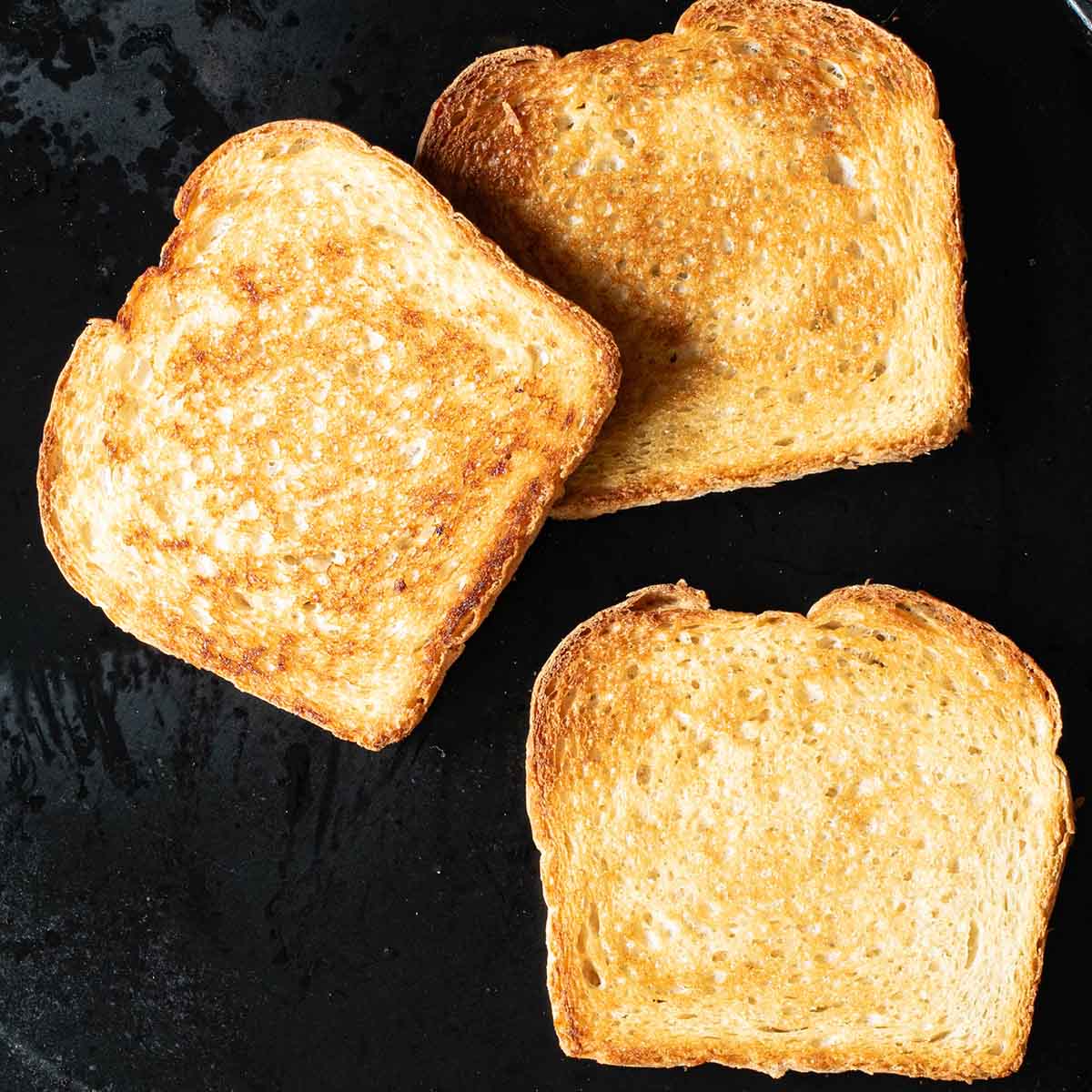 Club sandwich bread toasted with butter for a restaurant worthy sandwich.