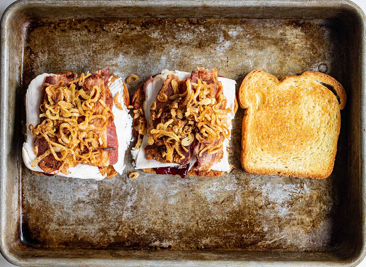 Fried onions leftover from a green bean casserole, added to a sandwich for texture.