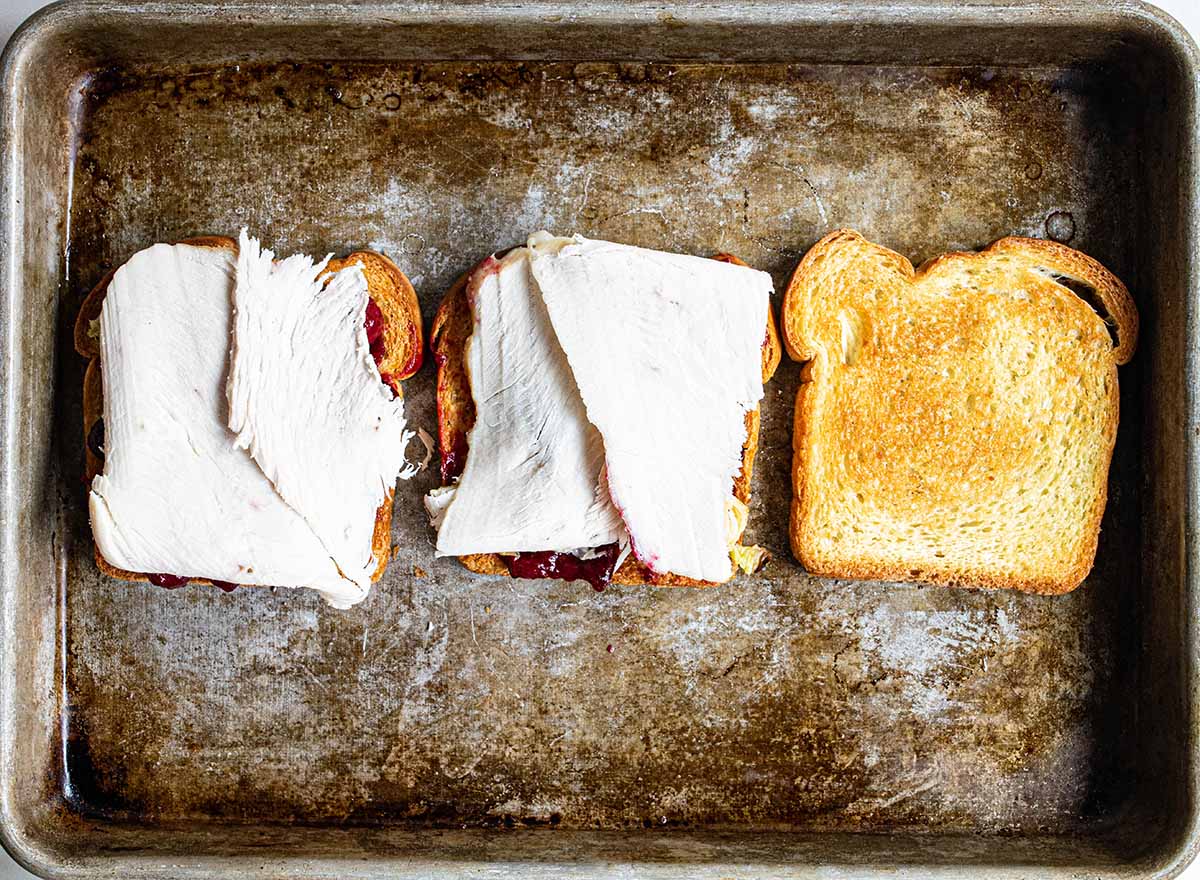 Leftover turkey breast, sliced thin, and then added to the sandwich.