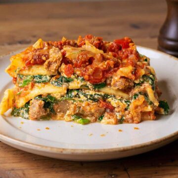 Spinach lasagna with meat sauce.